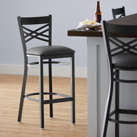 Lancaster Table & Seating Black Finish Cross Back Bar Stool with 2 1/2 inch Dark Gray Vinyl Padded Seat - Detached