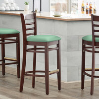 Lancaster Table & Seating Mahogany Finish Wooden Ladder Back Bar Height Chair with Seafoam Padded Seat - Detached Seat