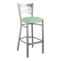 Lancaster Table & Seating Clear Coat Finish Cross Back Bar Stool with 2 1/2" Seafoam Vinyl Padded Seat