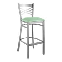 Lancaster Table & Seating Clear Coat Finish Cross Back Bar Stool with 2 1/2" Seafoam Vinyl Padded Seat - Detached