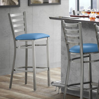 Lancaster Table & Seating Clear Coat Ladder Back Bar Height Chair with Blue Padded Seat - Detached Seat