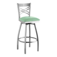 Lancaster Table & Seating Clear Coat Finish Cross Back Swivel Bar Stool with 2 1/2" Seafoam Vinyl Padded Seat