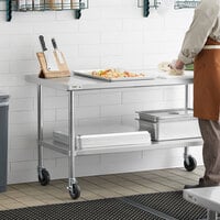 Regency 30 inch x 60 inch 16-Gauge 304 Stainless Steel Commercial Work Table with Undershelf and Casters