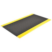 Notrax Pebble Step Sof-Tred Dyna-Shield 3' x 12' Black / Yellow Anti-Fatigue Mat 415S0312BY - 3/8" Thick
