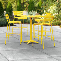 Lancaster Table & Seating 32 inch x 32 inch Yellow Powder-Coated Aluminum Bar Height Outdoor Table with Umbrella Hole and 4 Barstools