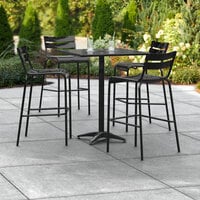 Lancaster Table & Seating 32 inch x 32 inch Black Powder-Coated Aluminum Bar Height Outdoor Table with Umbrella Hole and 4 Barstools