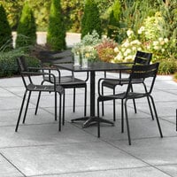 Lancaster Table & Seating 32 inch x 32 inch Black Powder-Coated Aluminum Standard Height Outdoor Table with Umbrella Hole and 4 Arm Chairs