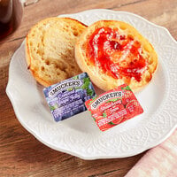 Smucker's Concord Grape and Strawberry Jelly 0.5 oz. Portion Cups - 200/Case