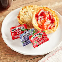Smucker's Concord Grape Jelly, Apple Jelly, and Strawberry Jam 0.5 oz. Portion Cups - 200/Case