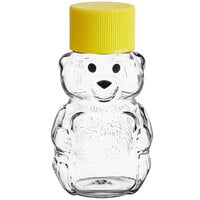 1.5 oz. (2 oz. Honey Weight) Clear PET Bear Honey Bottle with Pressure Sensitive Lined Yellow Lid