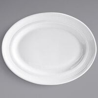 Tuxton CWH-136 Concentrix 13 3/4 inch x 10 1/2 inch White Oval China Platter - 6/Case