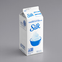 Dannon YoCream Silk Almond Milk Vanilla Soft Serve Mix 0.5 Gallon - 6/Case