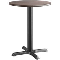 Lancaster Table & Seating 24" Round Reversible Birch / Ash Laminated Standard Height Table with Cross Cast Iron Base Plate
