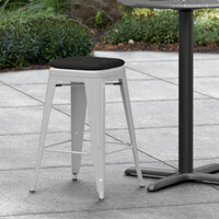 Lancaster Table & Seating Alloy Series Silver Stackable Metal Indoor / Outdoor Industrial Cafe Counter Height Stool with Black Fabric Magnetic Cushion