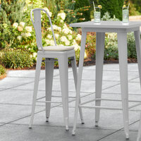 Lancaster Table & Seating Alloy Series Silver Stackable Metal Outdoor Cafe Barstool with Tan Fabric Magnetic Cushion
