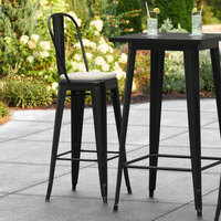 Lancaster Table & Seating Alloy Series Black Stackable Metal Outdoor Cafe Barstool with Tan Fabric Magnetic Cushion