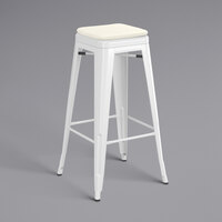 Lancaster Table & Seating Alloy Series White Stackable Metal Indoor / Outdoor Industrial Barstool with Tan Fabric Magnetic Cushion