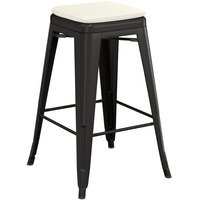 Lancaster Table & Seating Alloy Series Black Stackable Metal Indoor / Outdoor Industrial Cafe Counter Height Stool with Tan Fabric Magnetic Cushion