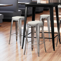 Lancaster Table & Seating Alloy Series Clear Coat Stackable Metal Indoor Industrial Barstool with Gray Fabric Magnetic Cushion