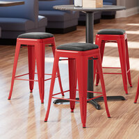 Lancaster Table & Seating Alloy Series Red Metal Indoor Counter Height Barstool with Black Vinyl Cushion