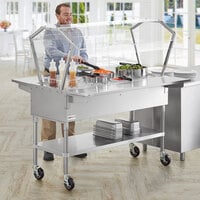 ServIt CFT4KTS Stainless Steel 4 Pan Ice-Cooled Food Table with 2-Sided Sneeze Guard, Side Trays, and 5 inch Casters