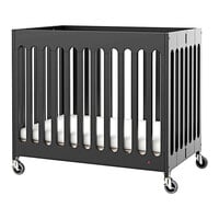Foundations Boutique 24 inch x 38 inch Ebony Compact Slatted Wood Folding Crib with Oversized Casters and 3 inch InfaPure Mattress