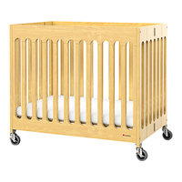 Foundations Boutique 24 inch x 38 inch Natural Compact Slatted Wood Folding Crib with Oversized Casters and 3 inch InfaPure Mattress