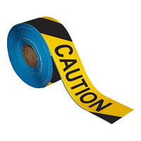 Superior Mark 4" x 100' Black / Yellow Striped "Caution" Safety Floor Tape