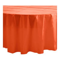 Table Mate 84" Tangerine Round Plastic Table Cover - 24/Case