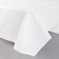54 inch x 108 inch White Tissue / Poly Table Cover - 25/Case
