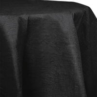 Creative Converting 923260 82" Black Velvet OctyRound Tissue / Poly Table Cover - 12/Case