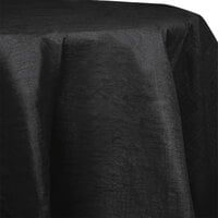 Creative Converting 923260 82 inch Black Velvet OctyRound Tissue / Poly Table Cover - 12/Case