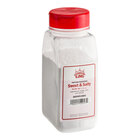 A 9 oz. container of Carnival King Sweet and Salty Popcorn Seasoning with a red lid.