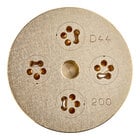 A circular gold pasta die with holes in it.