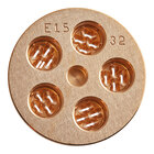 A circular gold pasta die with four holes in it.
