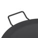 An American Metalcraft round black wrought iron griddle with a handle.