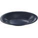 A black round platter with a wide rim and blue speckles on a white background.