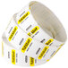 A roll of white National Checking Company labels with yellow and black text that says "Tuesday"