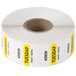A roll of white National Checking Company Tuesday food labeling stickers with yellow and white writing.