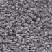 A close-up of a grey Cactus Mat carpet with small spots.