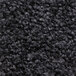 A black rubber-backed carpet with a close texture.