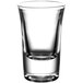 An Arcoroc tall shot glass with a white background.