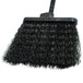 A Carlisle warehouse broom with black unflagged bristles and a black handle.