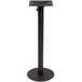A BFM Seating black metal table base with a metal pedestal and umbrella hole.