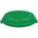 A green plastic lid on a Tablecraft green cast aluminum casserole dish with a white background.