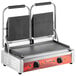 An Avantco double commercial panini grill on a counter with two griddles.