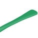 A green cast aluminum long ladle with a white background.