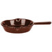 A maroon Tablecraft cast aluminum fry pan with a handle.