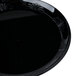 A black WNA Comet plastic plate with a design.