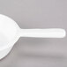 A Tablecraft white cast aluminum fry pan with a handle.